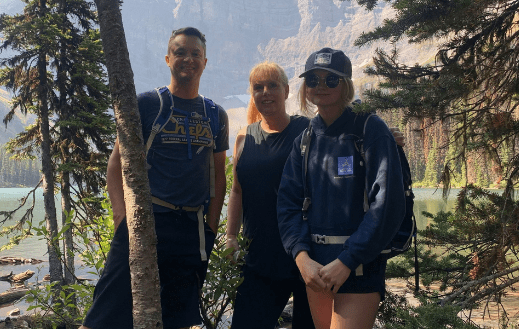 Clarke family hiking in the mountains for PF