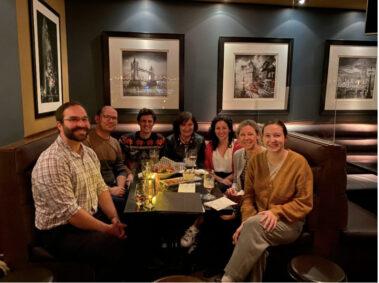 People from McGill sitting around a table in a restaurant