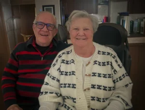 Brian and Anne Hurding are enjoying life together again three years after Anne’s double lung transplant. Anne is wearing a sweater knit for her by her daughter Suzanne.