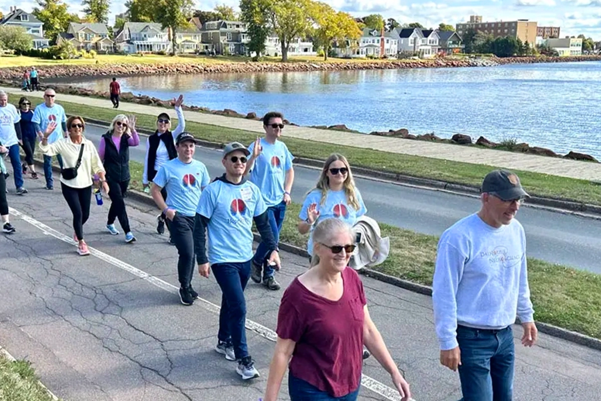 Man running a marathon for PF